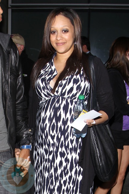 tia mowry pregnant belly. Pregnant Tia Mowry at Laker#39;s