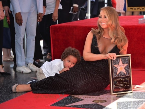 Moroccan Cannon holds on to his mom Mariah Carey at her Hollywood Walk of Fame Ceremony