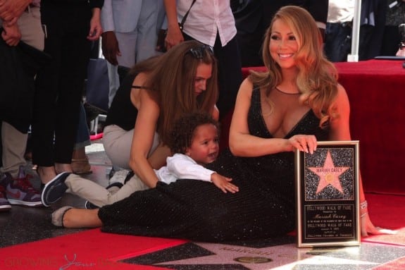 Moroccan Cannon holds on to his mom Mariah Carey at her Hollywood Walk of Fame Ceremony