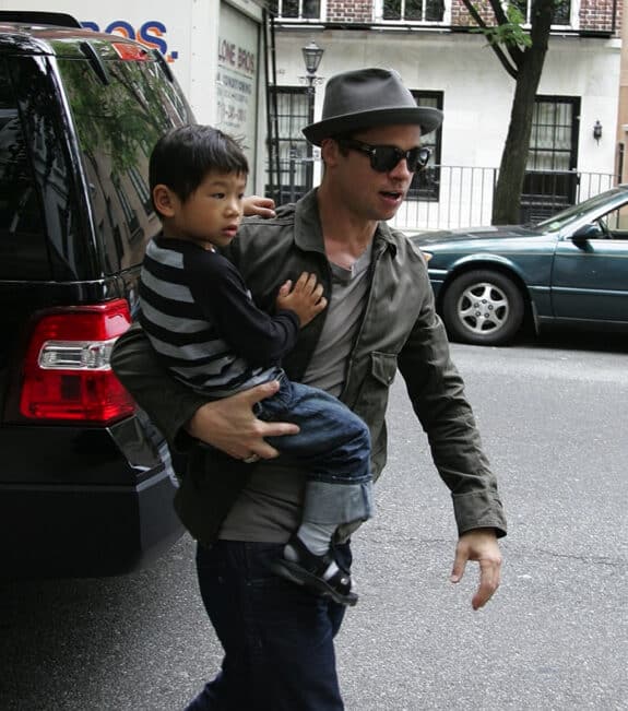 Father Brad Pitt seen in the Upper West side, Nyc, taking Pax to a Pediatric Health Service office