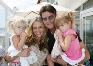 Sam and Lola Sheen with their dad and his fiance Brooke Mueller