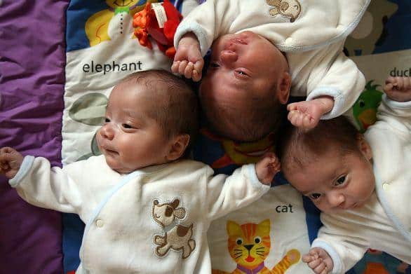 Couple Adopts Rare Identical Triplets bates+triplets