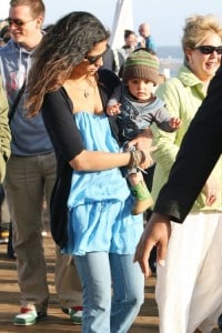 Camila Alves with son Levi at Surfrider Art and Music Festival