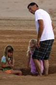 Irv Richards with granddaughters Sam and Lola Sheen in Hawaii