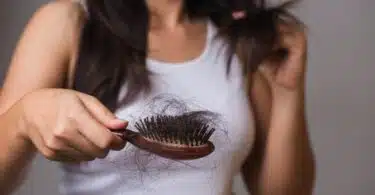 woman experiencing hair loss