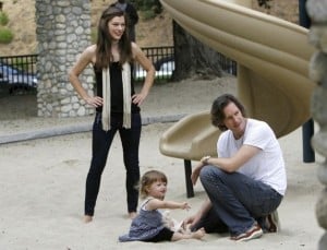 Milla Jovovich with boyfriend Paul Anderson and daughter Ever