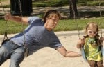Larry Birkhead and Dannielynn play at the park
