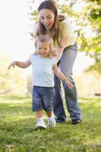 mom chasing toddler