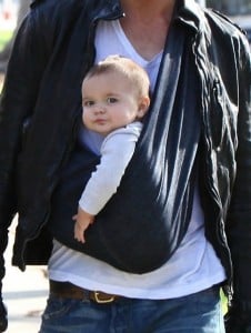 Cam Gigandet wears his baby Everleigh in a sling