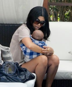 Kourtney And Mason Cuddle Poolside in Miami