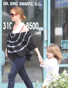 Isla Fisher Keeps Her Bump Covered in LA