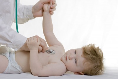 child getting examined
