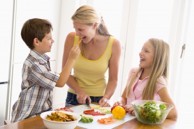 Mom Preparing Food With Her Kids