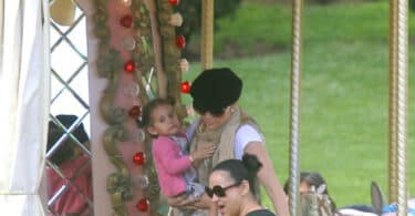 Jennifer Lopez Holding Emme, while a nanny looks after Max