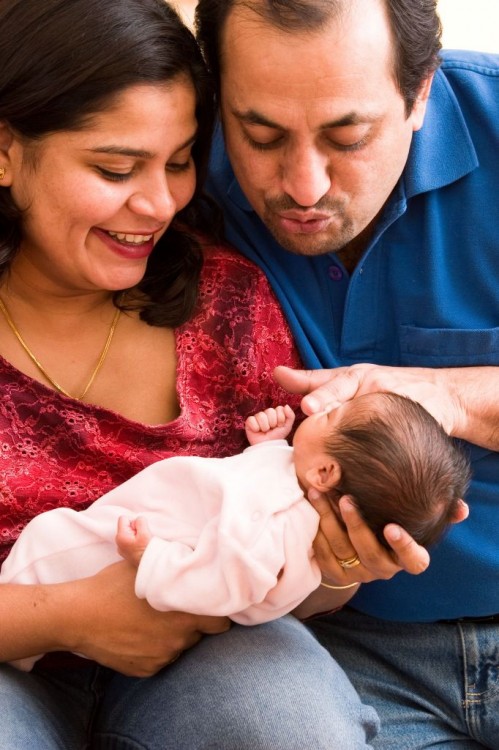 couple with their baby