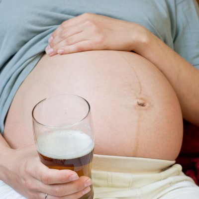 expectant mom with beer