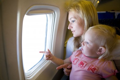 Mom and Daughter on Airplane
