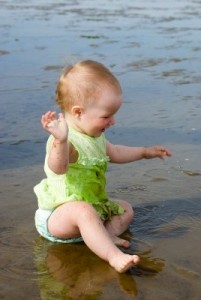 Little Girl Enjoying The Beach