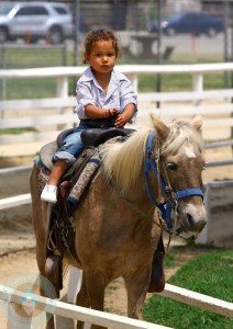 Nahla Rides a Horse at the park