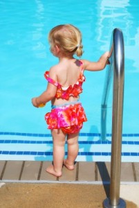 child going into pool