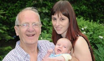 Raymond Calvert and partner Charlotte with son Jamie Rai