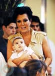 Kriss Jenner holds grandson Mason Disick