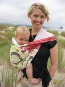 Model wearing PUJ sling in Cannon Beach brick