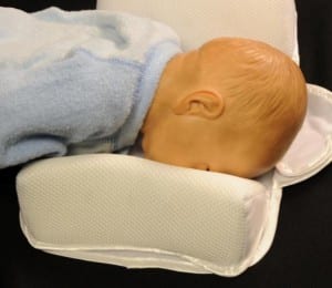 Suffocation Risk: Infant sleep positioner