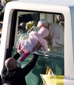 Pope Benedict XVI is handed baby Maria Tyszczak to be blessed
