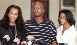 James Willie Jones, center, and his wife Deborah McFadden-Jones, right, with their attorney, Natalie Jackson