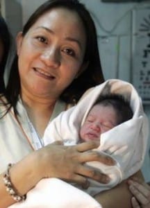 Photo of abandoned baby with a nurse