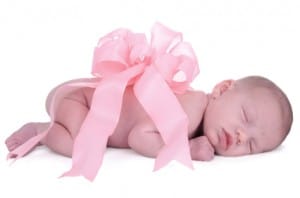 newborn baby with a gift