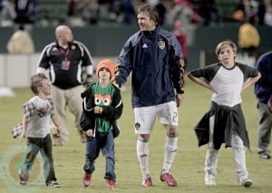 David Beckham walks with sons(l-r) Cruz, Romeo and Brooklyn