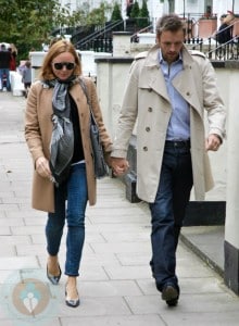 A pregnant Stella McCartney strolling with husband Alasdhair Willis