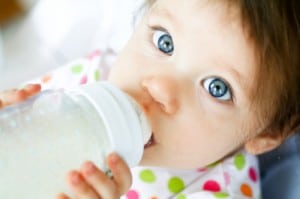 Infant Drinking from a Bottle