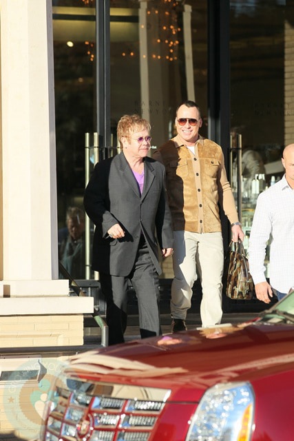 David Furnish and Sir Elton John shopping at Neiman Marcus on Dec26th