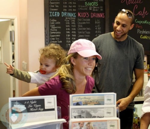 Kendra Wilkinson with husband Hank and their son