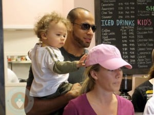 Kendra Wilkinson with husband Hank and their son