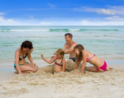 family enjoy the beach