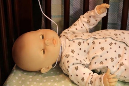 Re-creation of baby with the cord around it's neck