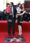 Adam Sandler with wife Jackie and daughters Sunny (l) and Sadie (r)