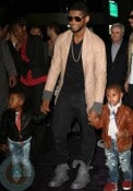 Usher with his sons Usher Raymond V and Naviyd Ely Raymond