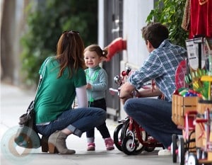 Alyson Hannigan and husband Alexis Denisof with daughter Satyana