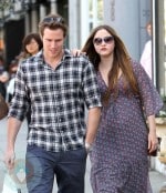 An expectant Devon Aoki and her fiance James Bailey