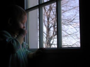 child looking out the window