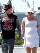 A pregnant Pink (Alecia Moore) and husband Carey Hart