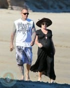 An expectant Pink and husband Carey Hart