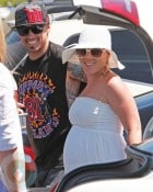 A pregnant Pink (Alecia Moore) and husband Carey Hart