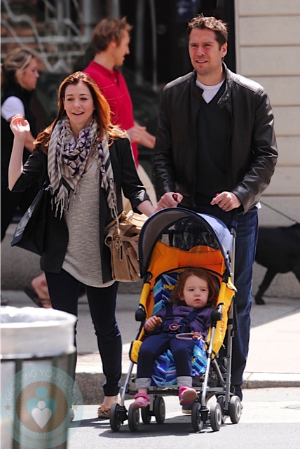 Alyson Hannigan, Alexis Densiof and daughter Satyana in NYC