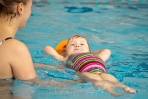 mom and baby swimming